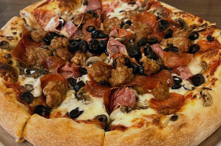 Pizza with Mushrooms, Salami, Pepperoni, Sausage and Olives