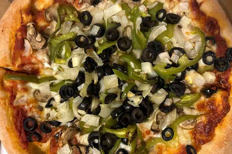 Vegetarian pizza with Mushrooms, Olives, Green Peppers, and Onion